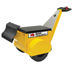 Super PowerPusher® electric tug transporting a heavy industrial cart in a manufacturing facility